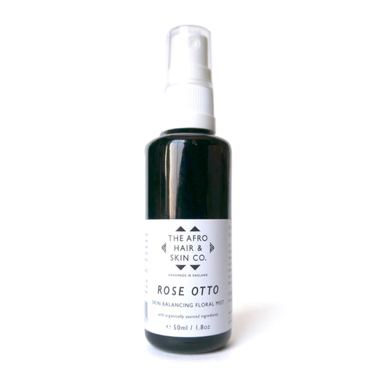 Rose Otto Skin Balancing Floral Mist in dark glass bottle on white background. Best skincare products for black skin.